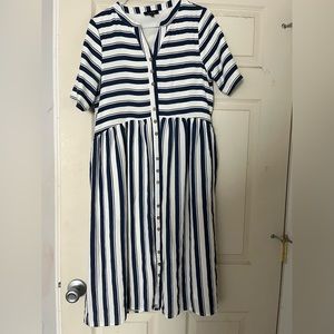 This is a midi dress from a boutique called Roolee. It’s a size medium.